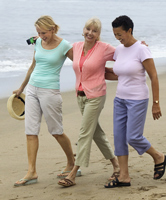 Women walking on beach