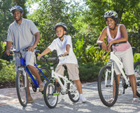 Family riding bikes