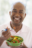 Man eating salad