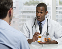 Physician showing meds